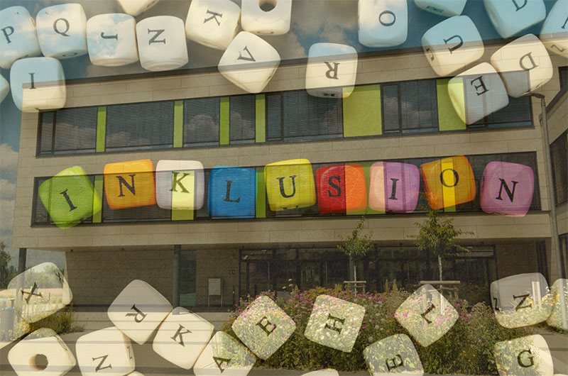 Würfel mit der Aufschrift Inklusion